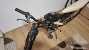 Bicicleta pegas cu motor