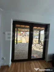 Casă de vânzare cu teren 1.530 mp, garaj, alarmă și supr
