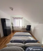 Casă individuală P+M cu livadă, seră, finisaje din lemn 