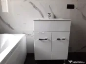 Vand dulap baie nou , cu lavoar si baterie la 400 ron .