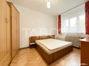 Apartament 2 camere decomandate boxa de vanzare in cartierul 