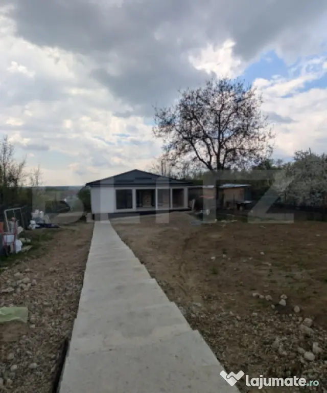 Casă pe structură metalică 3 camere 141 mp utili, teren
