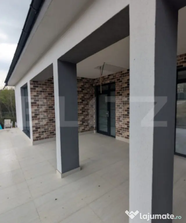 Casă pe structură metalică 3 camere 141 mp utili, teren