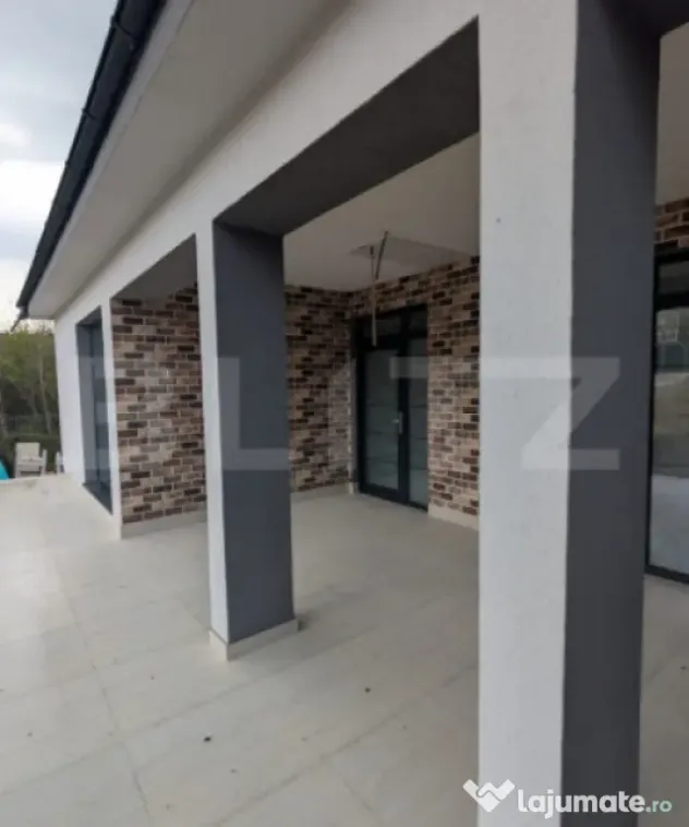 Casă pe structură metalică 3 camere 141 mp utili, teren