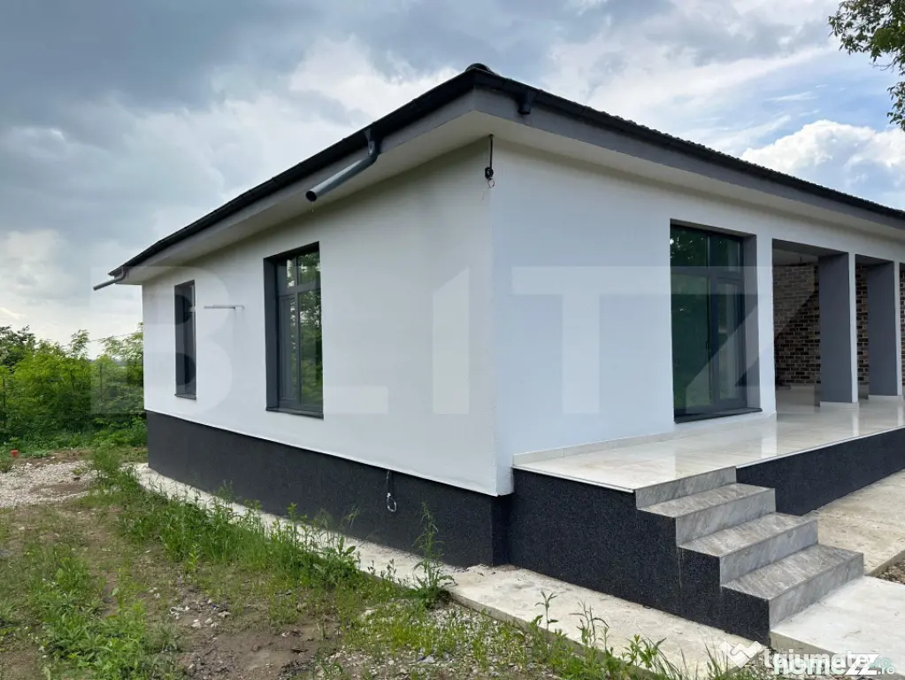 Casă pe structură metalică 3 camere 141 mp utili, teren