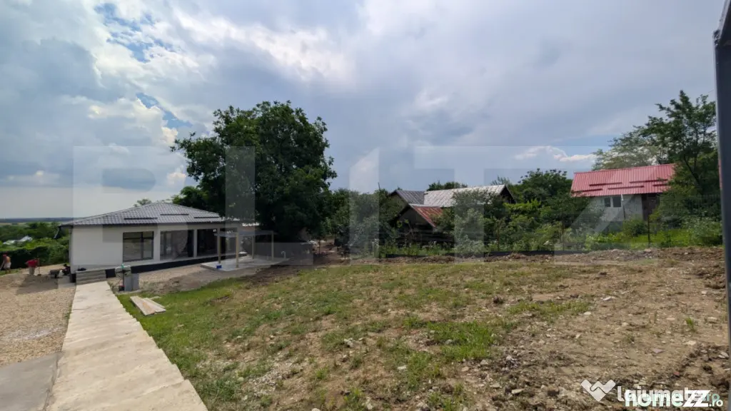 Casă pe structură metalică 3 camere 141 mp utili, teren