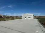 Hală 194 mp utili, platformă betonată 770 mp și teren to