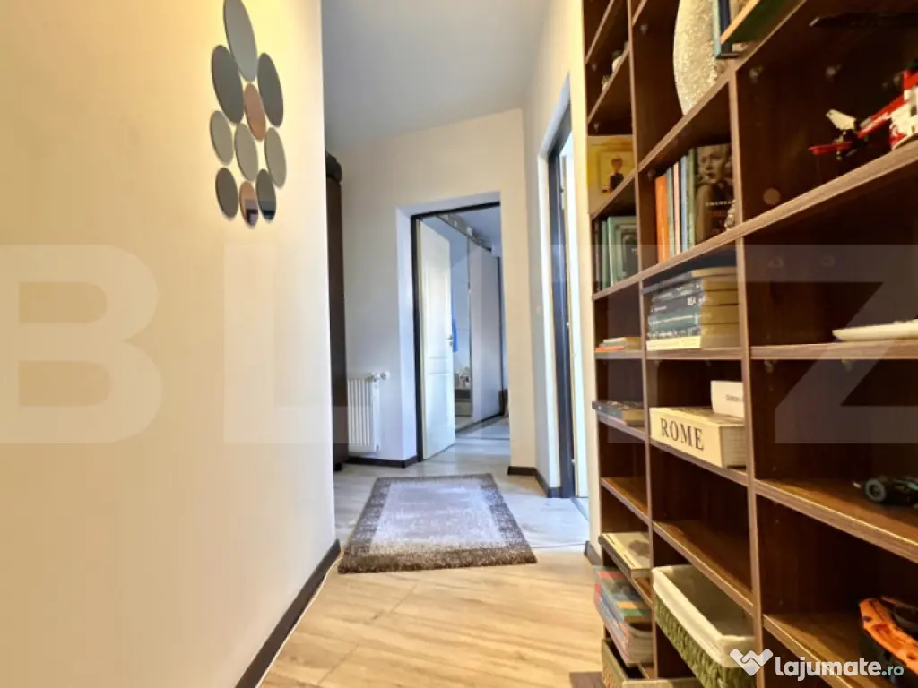 Apartament cu 3 camere și 2 băi, curte comuna, centrală p