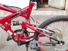 Bicicleta DHS cu suspensii