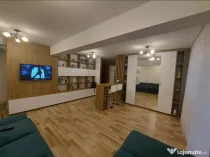 Apartament unic cu 2 camere,2 bai si curte individuala