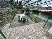 Apartament de locuit + atelier auto + terasa și curte gener 