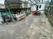Apartament de locuit + atelier auto + terasa și curte gener 