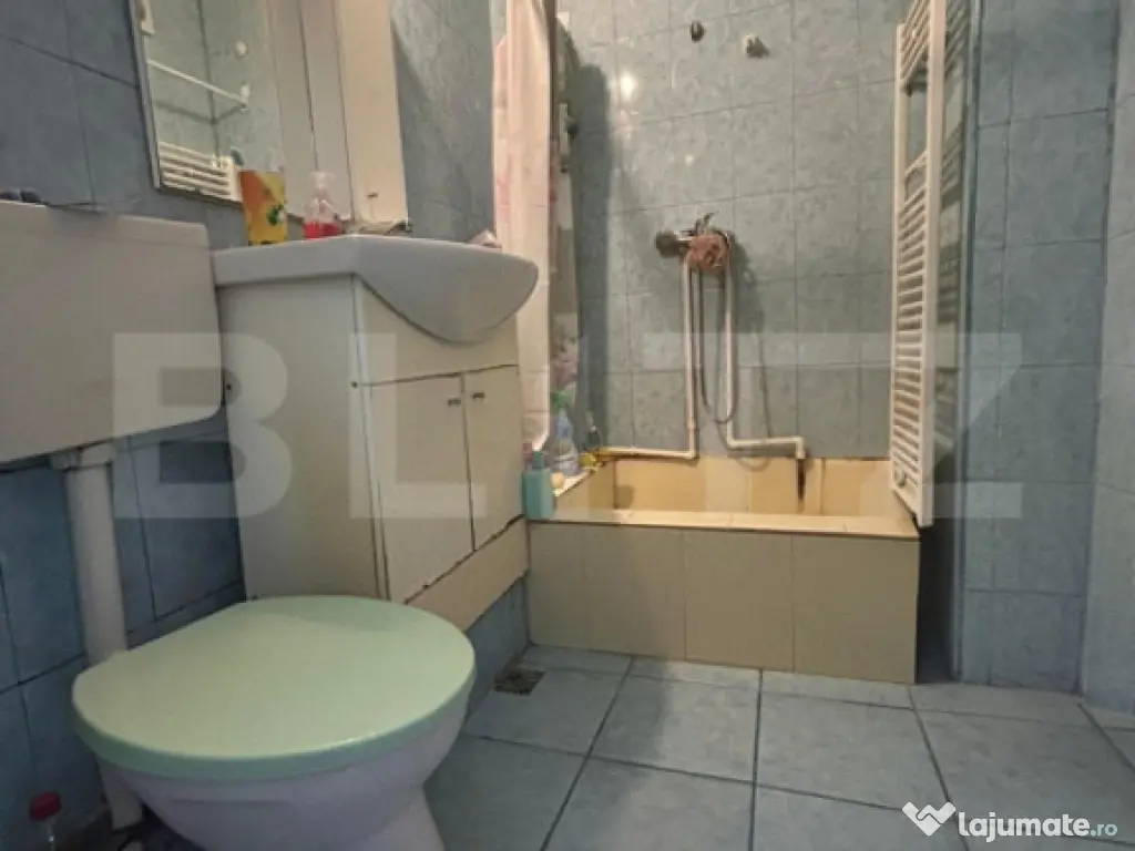 Garsonieră cochetă, complet mobilată, cu centrală propri