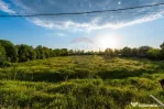 Teren intravilan 4.734 mp – Front 50 m, utilități la ...