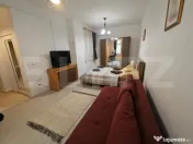 Apartament ultracentral, cu o cameră si curte comună. 