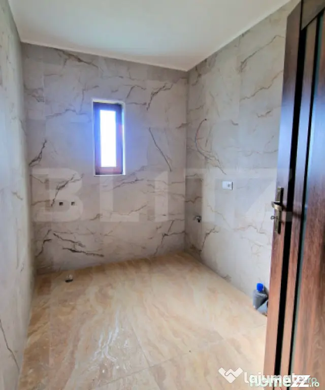 Casa individuala 110 mp utili, 400 mp teren, finisata modern