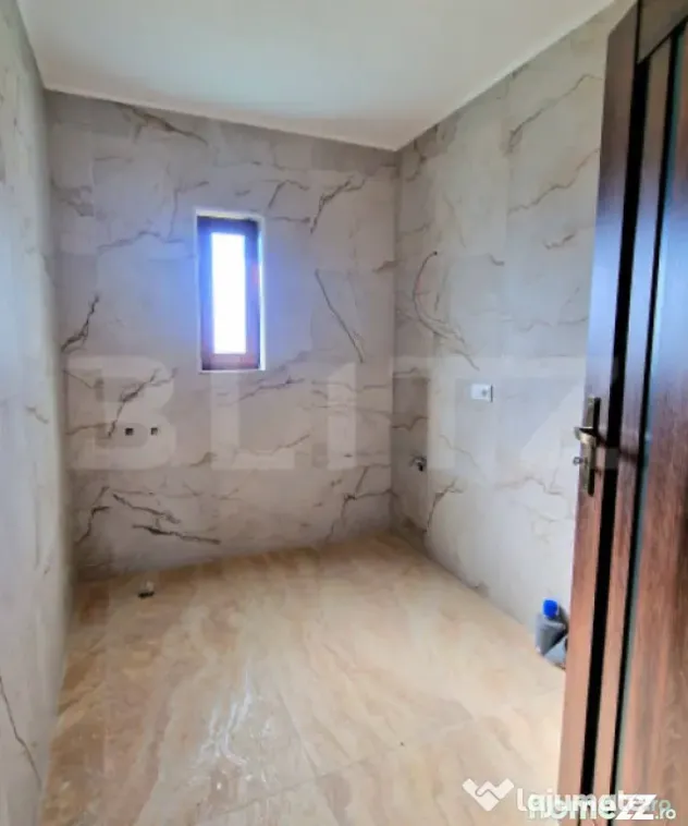 Casa individuala 110 mp utili, 400 mp teren, finisata modern