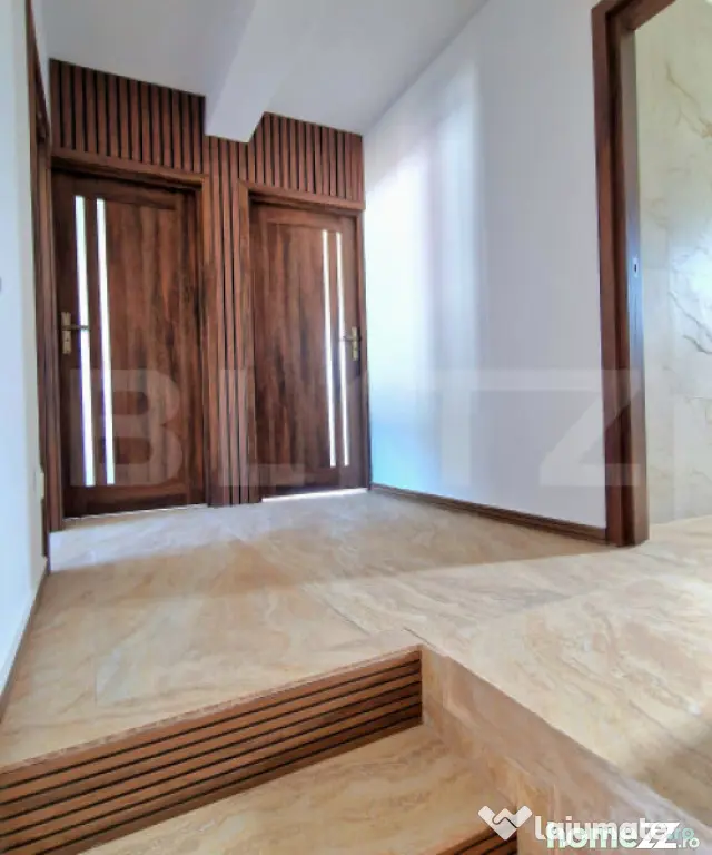 Casa individuala 110 mp utili, 400 mp teren, finisata modern