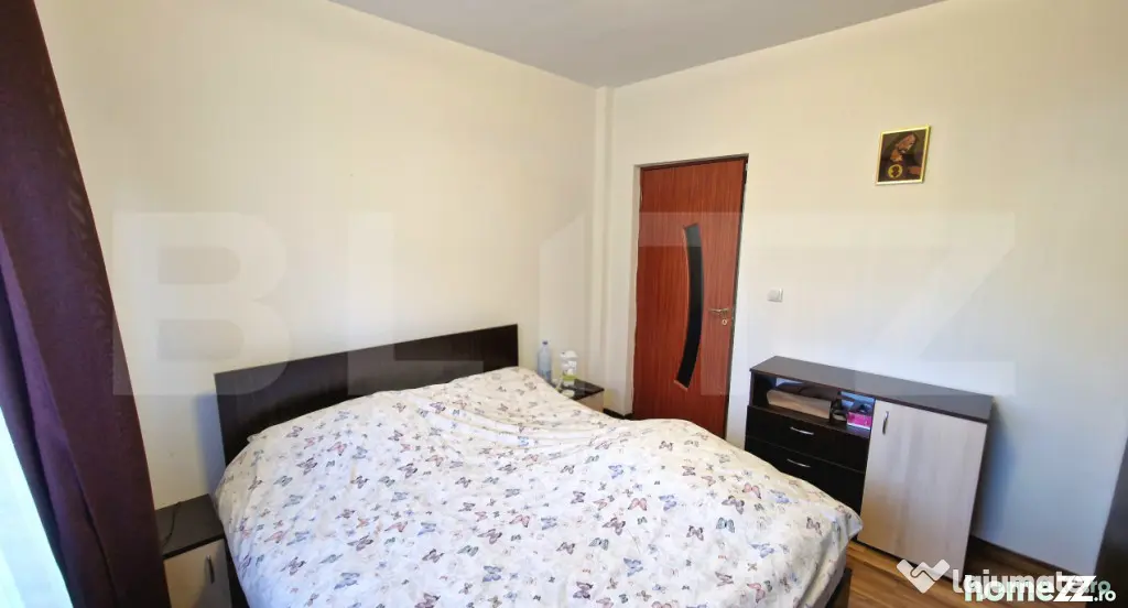 Apartament cu 2 dormitoare, balcon inchis, parter inalt, par - Floresti (Cluj)