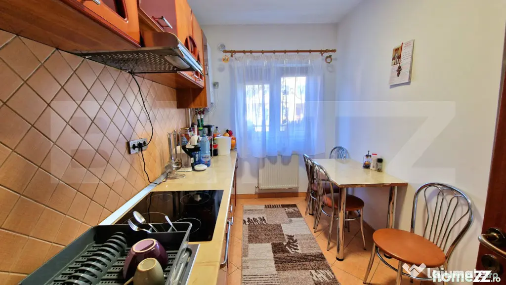 Apartament cu 2 dormitoare, balcon inchis, parter inalt, par - Floresti (Cluj)