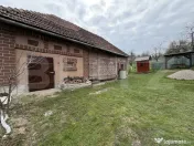 Casă cu 3 camere în suprafață de 80 mp și un teren de 2 