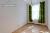 Apartament cu centrală proprie și grădină privată de 19 