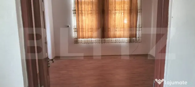 Spatiu cu 3 camere de inchiriat,teren 1325 mp,Unirea