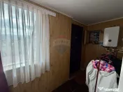 Casă cu teren si demisol In Tifesti 