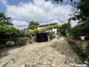 Casă cu teren si demisol In Tifesti 