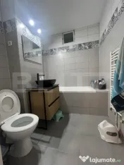 Apartament Spațios cu 3 Camere în Cartierul Unirii 