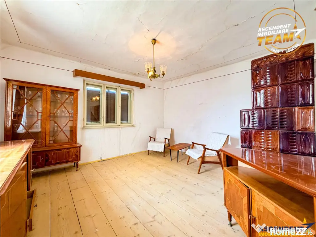 Casa din caramida cu 1.087 mp teren, pozitie centrala, utili