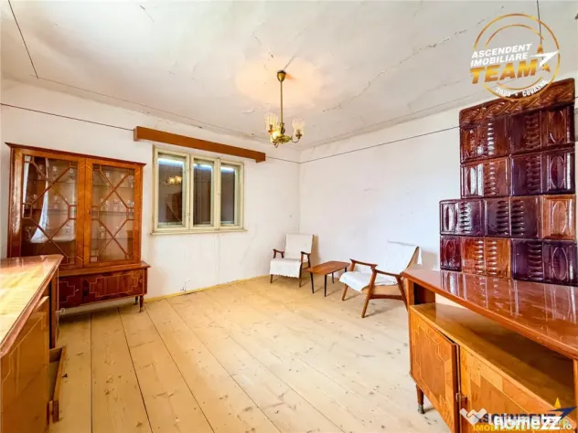 Casa din caramida cu 1.087 mp teren, pozitie centrala, utili