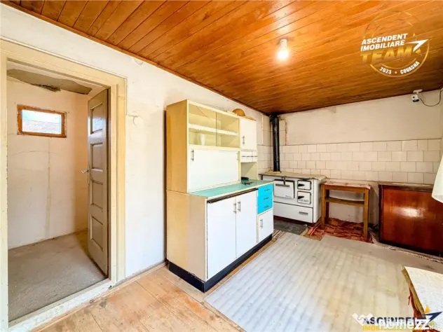 Casa din caramida cu 1.087 mp teren, pozitie centrala, utili
