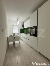 Apartament 3 camere, 2 bai, decomandat, etaj intermediar
