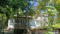 Casa Batranesaca si Teren de Vanzare in Ipotesti 