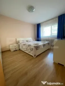Apartament cu 2 camere, decomandat, loc de parcare, zona Tra