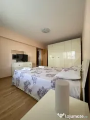 Apartament cu 2 camere, decomandat, loc de parcare – Zona 