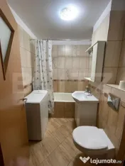 Apartament cu 2 camere, decomandat, loc de parcare – Zona 