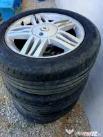4 jante aliaj 4x100 pe 16" originale Renault, Dacia cu anvelope vara 205/55/16.