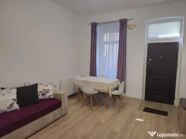 Apartament cu 2 camere, 55mp, la curte comuna, in zona Centr