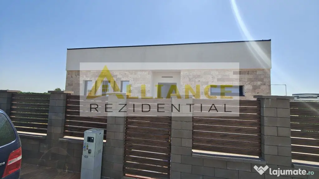 Casa pe parter cu 3 camere, 2 bai si teren de 375 mp