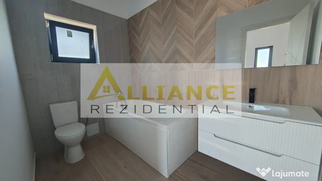 Casa pe parter cu 3 camere, 2 bai si teren de 375 mp