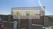 Casa pe parter cu 3 camere, 2 bai si teren de 375 mp
