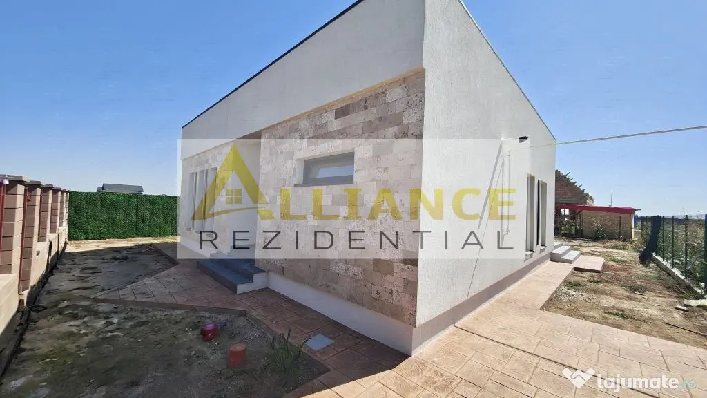 Casa pe parter cu 3 camere, 2 bai si teren de 375 mp