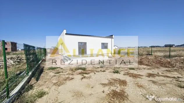 Casa pe parter cu 3 camere, 2 bai si teren de 375 mp