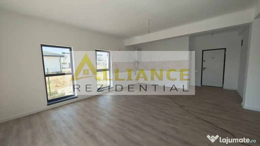 Casa pe parter cu 3 camere, 2 bai si teren de 375 mp