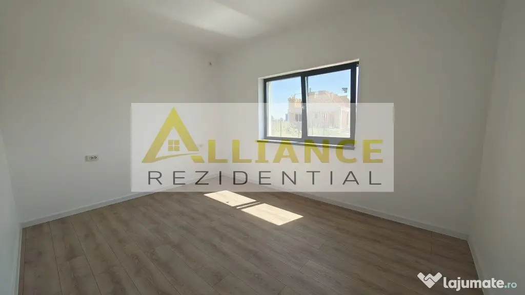 Casa pe parter cu 3 camere, 2 bai si teren de 375 mp