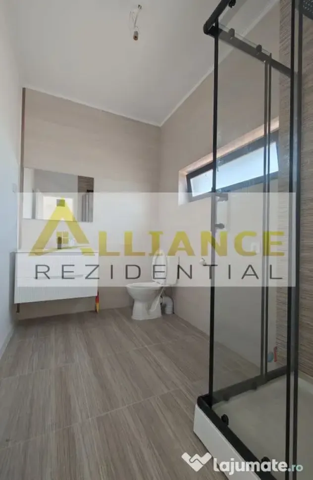 Casa pe parter cu 3 camere, 2 bai si teren de 375 mp