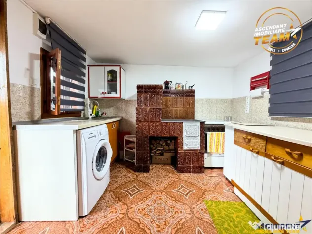 Casa cu teren generos de 1.315 mp, bucatarie de vara complet