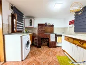 Casa cu teren generos de 1.315 mp, bucatarie de vara complet 
